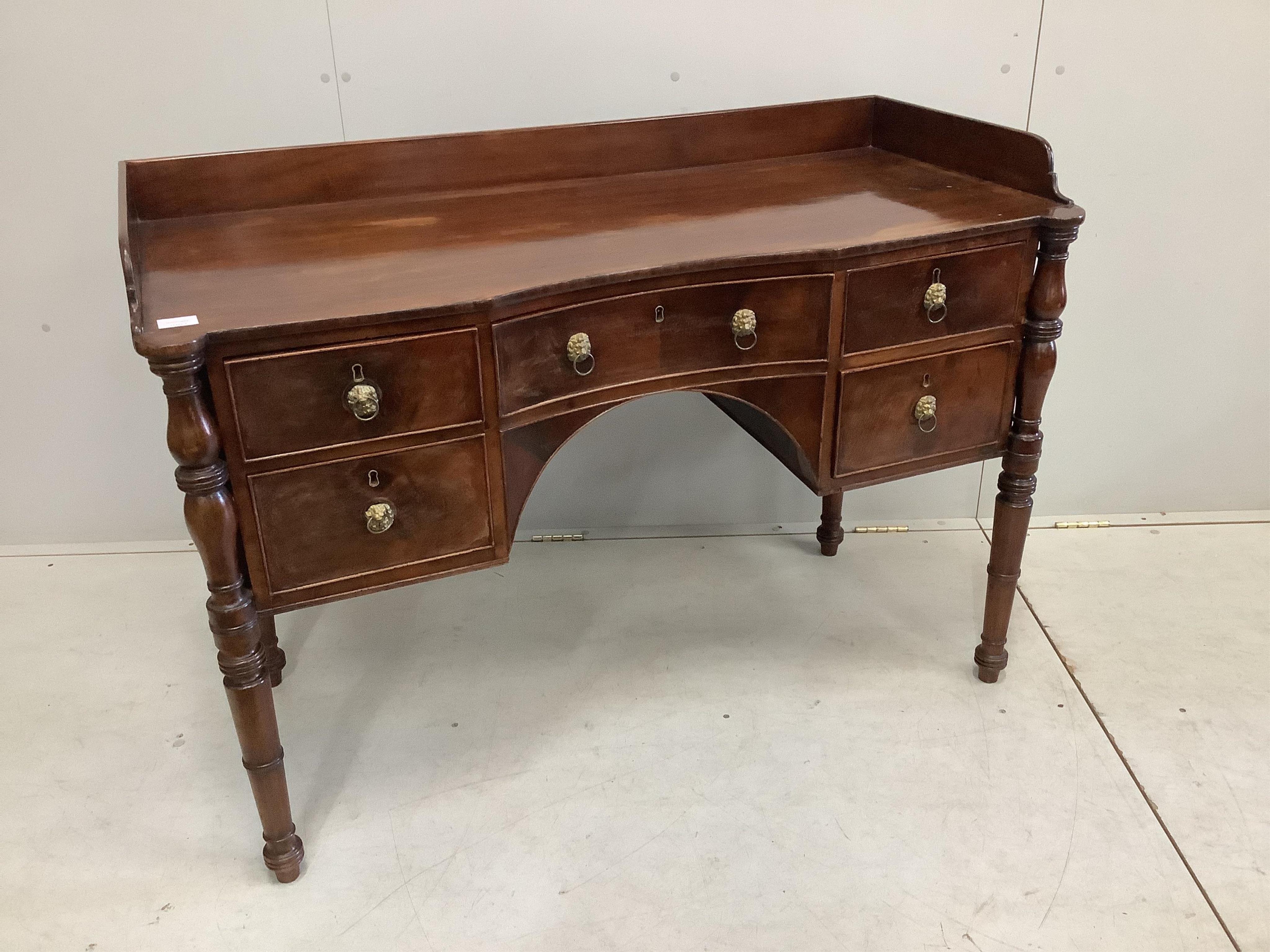 A Regency mahogany concave washstand, width 122cm, depth 55cm, height 86cm. Condition - fair